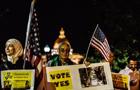 Nearly 100 people protested American military intervention in Syria on Boston Common last week at part of the National Day ... Nearly 100 people protested American military intervention in Syria on Boston Common last week at part of the National Day ...