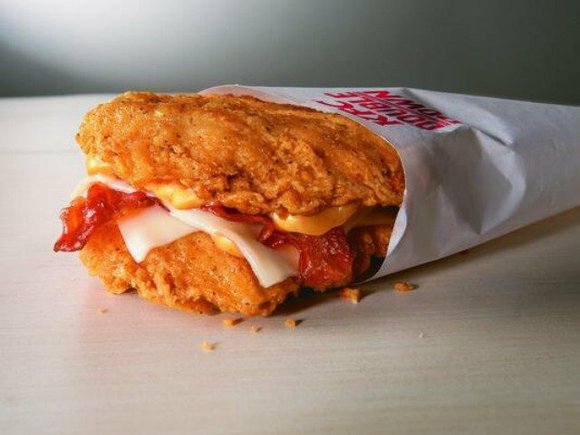 KFC is bringing back the Double Down, a bacon and cheese sandwich that uses two fried chicken filets as a ... KFC is bringing back the Double Down, a bacon and cheese sandwich that uses two fried chicken filets as a ...