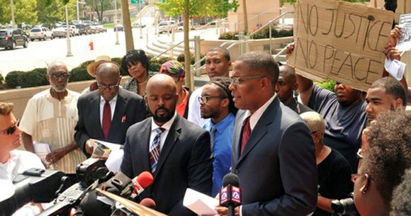 ST. LOUIS (NNPA) – Sweltering heat didn’t keep more than 50 people from gathering at the Eisenhower Federal Building for ... ST. LOUIS (NNPA) – Sweltering heat didn’t keep more than 50 people from gathering at the Eisenhower Federal Building for ...