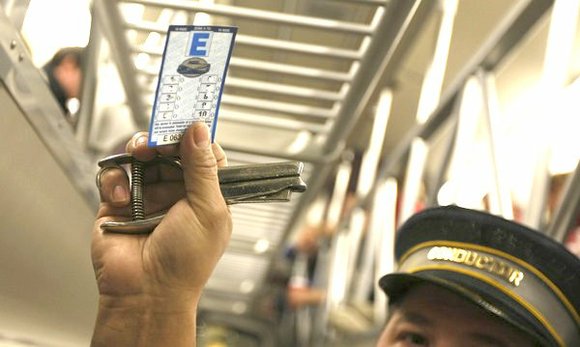 Dorian Lofton regularly rides the Metra train from his home in Matteson, Ill., to his job as a teacher in ... Dorian Lofton regularly rides the Metra train from his home in Matteson, Ill., to his job as a teacher in ...