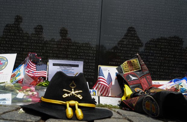 1st Cavalry Division hat at the Vietnam Memorial Wall on Monday, May 27, 2013.