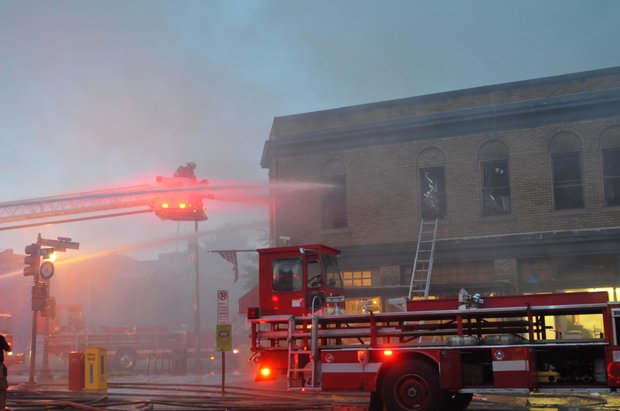 D.C. Firefighter’s battle a four-alarm blaze that destroyed Frager’s Hardware in Southeast on Wed., June 5. More than 200 fire fighters from the District and Joint Base Anacostia Bolling fire departments fought to control the fire. Smoke from the fire could be seen for miles. Frager’s has been serving the Capitol Hill community since 1920.