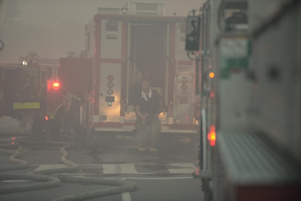 An unidentified D.C. firefighter on the scene of a 4-alarm fire that destroyed Frager’s Hardware in Southeast on Wed., June 5.