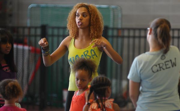 Score 4 More Inc. hosted “Funday at the Fieldhouse” for Boston’s young women at the Melnea Cass Recreation Center on Saturday, June 1. The event, co-sponsored by the Department of Conservation and Recreation, Mass Black Lawyers, Friends of Melnea Cass Center and United Sisters of Color, included workshops for girls and their guardians on wellness, nutrition, self-esteem and empowerment along with activities like yoga, martial arts, Zumba, track and dance.