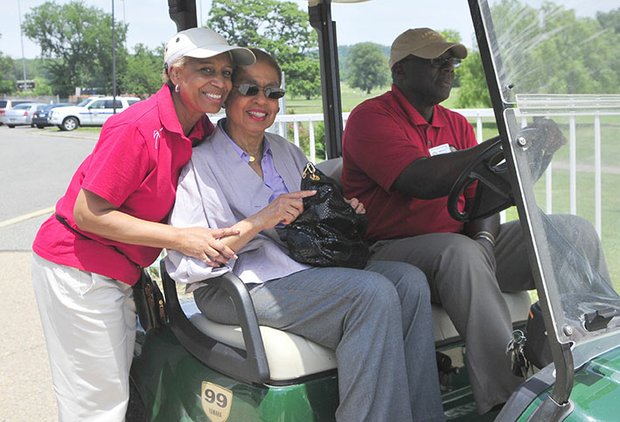 Shirley Washington, president of the Langston Junior Boys and Girls Golf Club welcomes Congresswoman Eleanor Holmes Norton to the 2013 Langston Golf Heritage Celebration on Sat., June 8 in Northeast.