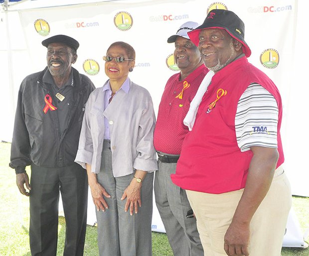 Congresswoman Eleanor Holmes Norton with historical Langston golfers (l-r) Calvin Peete, Lee Elder, and James Black on Saturday, June 8 at the Langston Golf Heritage Celebration in Northeast.