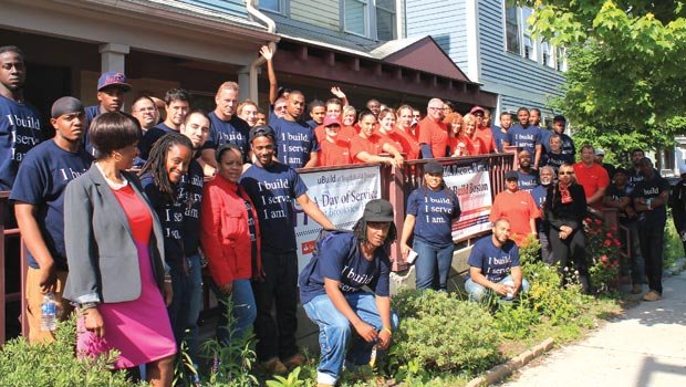 Volunteers from Sovereign Santander joined YouthBuild Boston construction staff and students to renovate five units at Brookview House in Dorchester. Attendees pictured included Kim Williams, Sovereign Santander District Executive; Deborah Hughes, Executive Director of Brookview House, Inc.; and Ken Smith, Executive Director of YouthBuild Boston. Brookview House provides a safe community setting with customized services that give homeless mothers and children the help and skills they need to succeed.