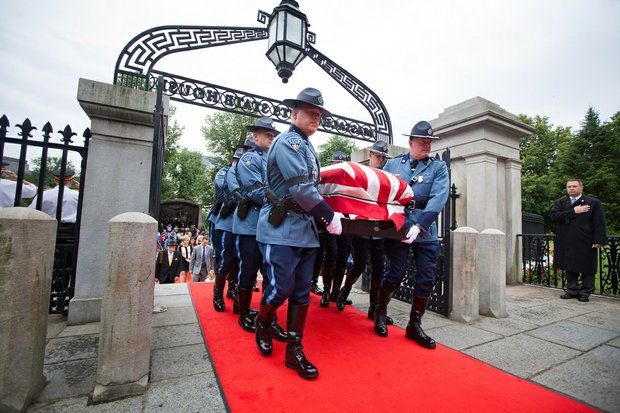 Thursday, June 13, 2013 - The Casket of Governor Argeo Paul Cellucci is brought into the State House by the State Police.