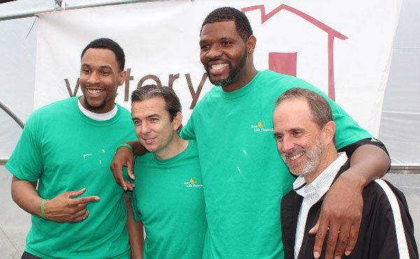 Celtics Forward Jared Sullinger, Boston Celtics Legend Walter McCarty, Sun Life Financial Senior Vice President of Operations David Healy, and Vice President and COO of Victory Programs Jim Pettinelli share a laugh at a recent event at ReVision Urban Farm. The Farm offers an agriculture program and operates a farm stand on Blue Hill Avenue offering fresh, low-cost produce to area residents.