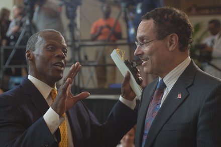 Former Rep. J.C. Watts Jr. (R-Okla.) with D.C. Mayor Vincent Gray (D) at the Frederick Douglass statue unveiling held at the U.S. Capitol June 19.