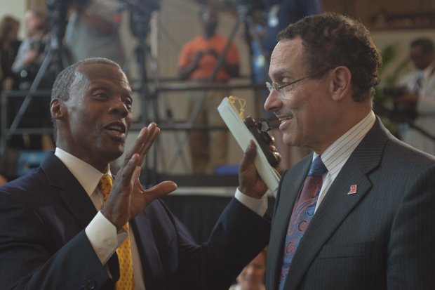 Former Rep. J.C. Watts Jr. (R-Okla.) with D.C. Mayor Vincent Gray (D) at the Frederick Douglass statue unveiling held at the U.S. Capitol June 19.