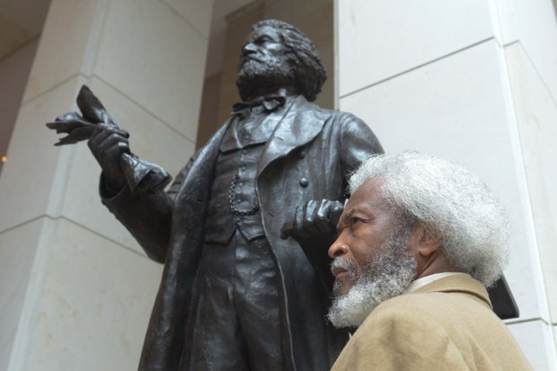 Michael Crutcher Sr., a Frederick Douglass impersonator from Nicholasville, Ky. attends the Frederick Douglass statue unveiling at the U.S. Capitol on Wed., June 19.