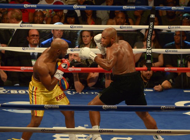 Seth 'Mayhem' Mitchell (right), jabs at opponent Johnathon Banks during their championship bout at the Barclay's Center on Saturday, June 22. Mitchell won by unanimous decision to reclaimed the North American Boxing Organization and World Boxing Council International belts.