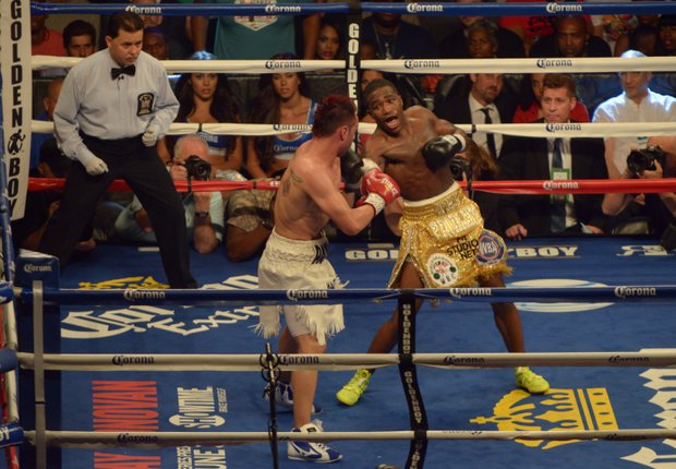 Adrien Broner (right), proved to be the most powerful puncher against Paulie Malignaggi during their boxing match at the Barclay's Center in Brooklyn, NY. Broner won the match in a 12-round split decision and took Malignaggi's welterweight title.