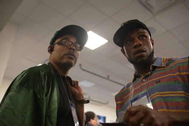Seth 'Mayhem' Mitchell (right), shares a moment with his trainer, Andre Hunter, before the post-fight interview after his victory over Johnathon Banks by unanimous decision Saturday, June 22 in Brooklyn, NY. Mitchell reclaimed the North American Boxing Organization and World Boxing Council International belts.
