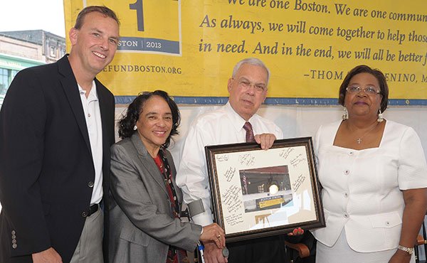 Mayor Thomas M. Menino and Boston School Superintendent Carol Johnson attend the Topping Off Ceremony for the Ferdinand Building in Dudley Square, Roxbury.