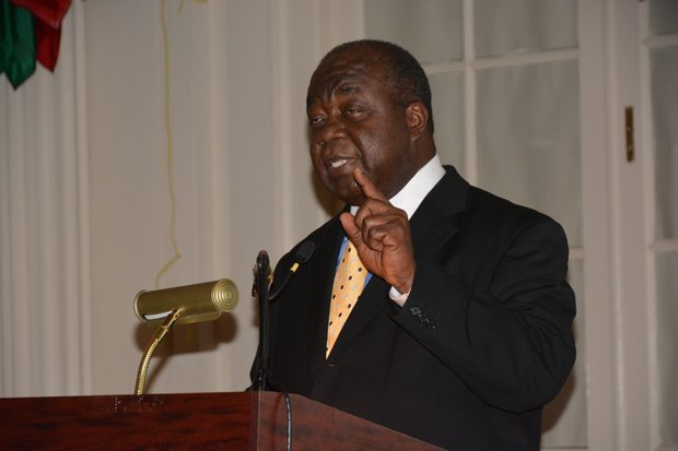 Ambassador Elliston Rahming welcomes guests to a celebration of the 40th anniversary of the Commonwealth of the Bahamas' independence at the Hall of the Americas OAS headquarters in Northwest D.C. on July 10, 2013.
