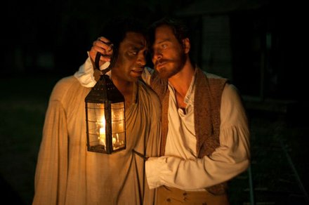 Chiwetel Ejiofor as "Solomon Northup" and Michael Fassbender as "Edwin Epps" in Steve McQueens's “12 Years A Slave."