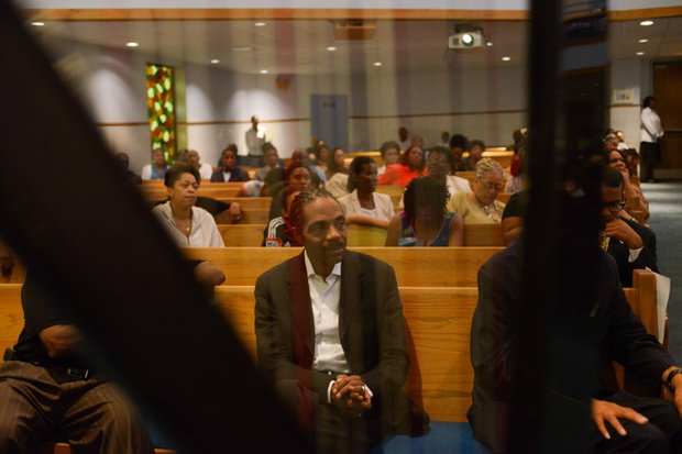 Harpist Jeff Majors was one of several performers participating in the pre-march rally celebration at Union Temple Baptist Church in Southeast on Tuesday, August 20.