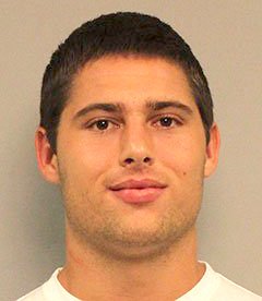 Former Vanderbilt football player Brandon Vandenburg is being held in the Metro Jail in lieu of $350,000 bond following his arrest during the night on a sex crimes indictment. Vandenburg, 20, of Indio, California, was taken into custody at Nashville International Airport after flying back to the city. He was taken to General Hospital for a mandatory HIV test required by Tennessee law before being transported to jail. Co-defendant Jaborian McKenzie, 19, of Woodville, Mississippi, surrendered at police headquarters at 8:30 a.m. today. He was also taken to General Hospital for the mandatory HIV test and is now being booked. McKenzie's bond is set at $50,000. Co-defendant Brandon Banks, 19, of Brandywine, Maryland, remains at large. Co-defendant Cory Batey, 19, of Nashville, was arrested Friday afternoon and remains jailed in lieu of $350,000 bond.