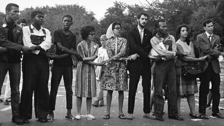 People holding hands during the 1963 March on Washington.