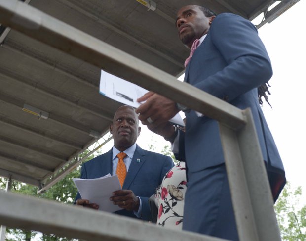 Harry Johnson (left), Martin Luther King Memorial Foundation president, talks with Journalist and motivational speaker Jeff Johnson during the Drum Majors for Justice Future Leaders Celebration at Freedom Plaza in Northwest on Fri., August 23.