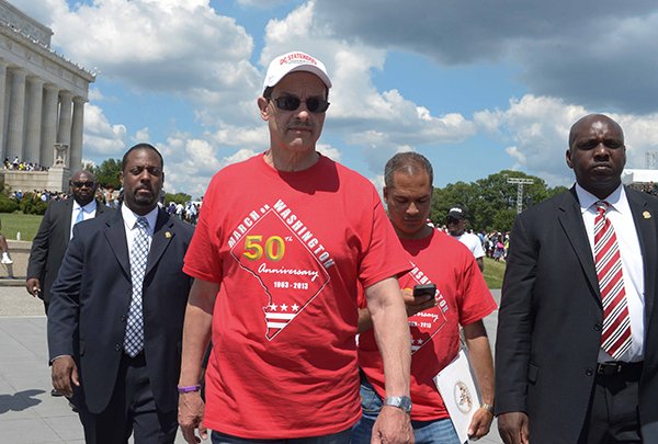 Mayor Vincent Gray (D), leaves the Lincoln Memorial after the March on Washington 50th Anniversary on Sat., August 24.