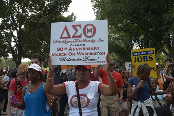 A sorority member proudly displays the Delta Sigma Theta insignia at the March on Washington 50th Anniversary on Sat., August 24.