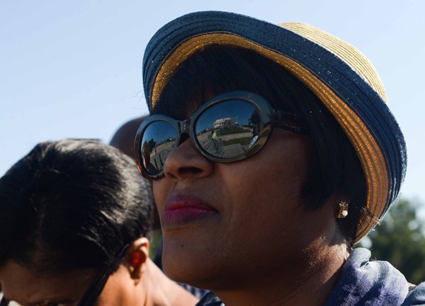 Reflection of the Lincoln Memorial through the eyes of a march participant at the March on Washington 50th Anniversary on Sat., August 24.