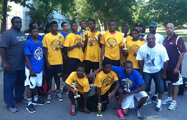 The Second Annual Franklin Park Invitational Basketball Tournament on Aug. 25th featured 12 teams from Mission Hill to Mattapan, including 14-and-under, 16-and-under and 21-and-under teams from the courts at Franklin Park. The Tournament was organized by local coaches Stan McLaren and Al “Ski” McLain. Photo shows members of the competing teams for the 16-and-under championship.