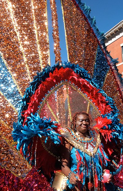 Vanessa Mascall dances with the queen costume for Soca Associates.