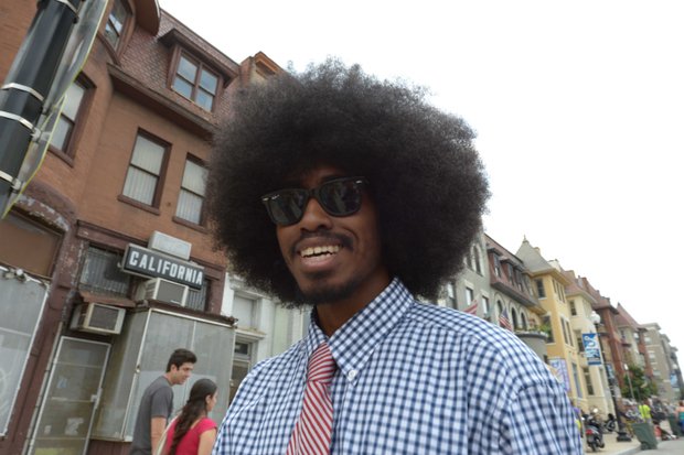 Jayrick Hayes, 26, sports an Afro during the 2013 Adams Morgan Day festivities in D.C. on Sunday, Sept. 8.