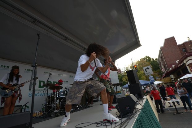 Future band member Eddie "EY" Young entertains the crowd during the 2013 Adams Morgan Day festivities in D.C. on Sunday, Sept. 8.