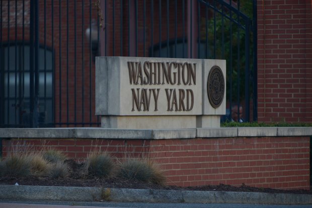 The Washington Navy Yard's M Street entrance in Southeast is seen here on Monday, Sept. 16, after a gunman went on a rampage, killing 12 people.