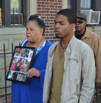 Kyam Livingston's son, Alex Livingston with his grandmother Anita Neal.
