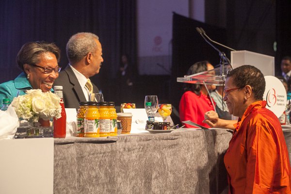 Dr. Julianne Malveaux greets Rep. Marcia L. Fudge, chairwoman, Congressional Black Caucus at the ALC 2013 Prayer Breakfast held at the Walter E. Washington Convention Center on Saturday, Sept. 21.