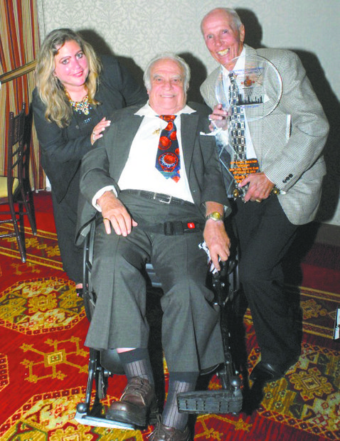 Manny Sokol, his daughter and presenter Dick Bavetta
