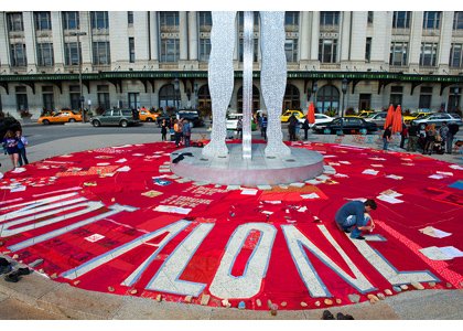 In the bright afternoon sun on Sunday, September 29, 2013, one hundred bright red quilts were displayed in the center ... In the bright afternoon sun on Sunday, September 29, 2013, one hundred bright red quilts were displayed in the center ...
