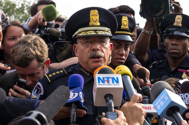 U.S. Capitol Police Chief Kim Dine briefs the press on Thursday after a woman was shot to death following a high-speed chase on Capitol Hill.