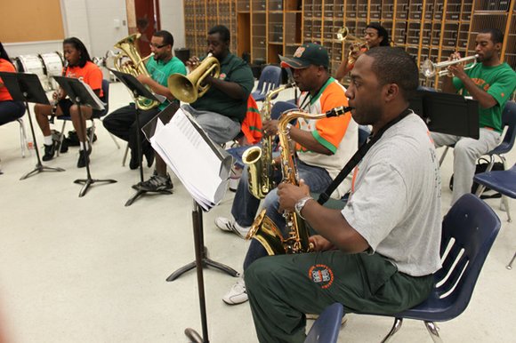 When Florida A&M University’s Marching 100 Alumni Band members get together, it’s like a great big family reunion. When Florida A&M University’s Marching 100 Alumni Band members get together, it’s like a great big family reunion.