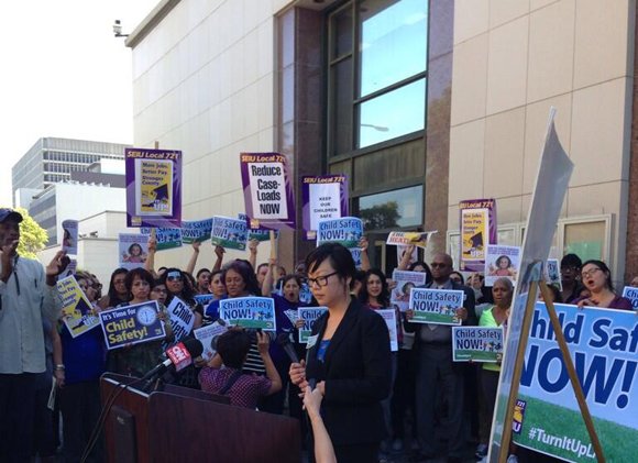 Dozens of county social workers protested downtown today to demand smaller caseloads, and their union filed a lawsuit aimed at ... Dozens of county social workers protested downtown today to demand smaller caseloads, and their union filed a lawsuit aimed at ...