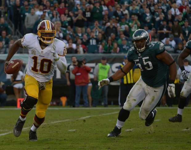 Washington Redskins QB Roberts Griffin, III picks up yardage in the fourth quarter.