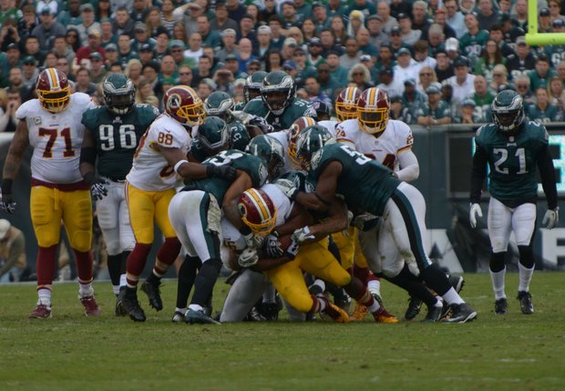 Philadelphia Eagles defense wrap up running back Alfred Morris in the second quarter. Redskins fell to the Eagles 16-24 on Sunday, Nov. 17 at Lincoln Financial Field in Philadelphia.