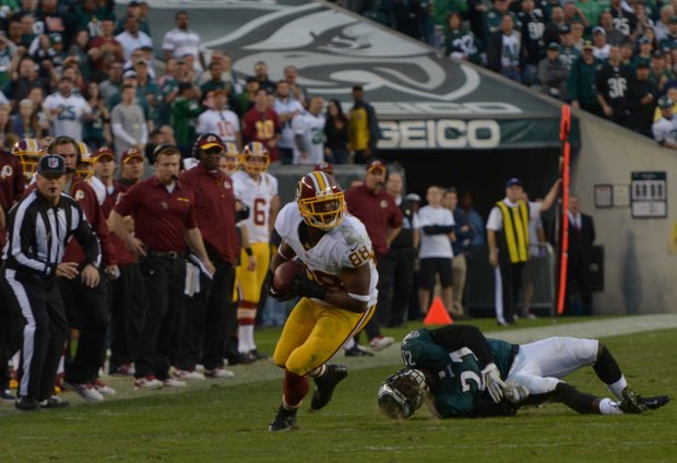 Washington Redskins wide receiver Pierre Garcon breaks a tackle for a long gain in the 4th quarter.