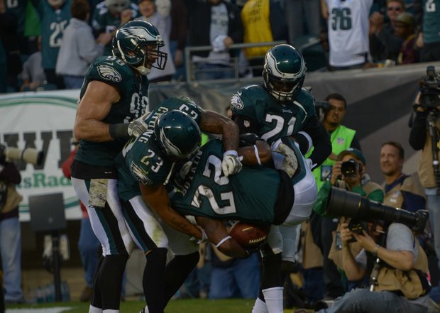 Philadelphia Eagles cornerback Brandon Boykin, center, celebrates after he caught an interception in the end zone in the 4th quarter.