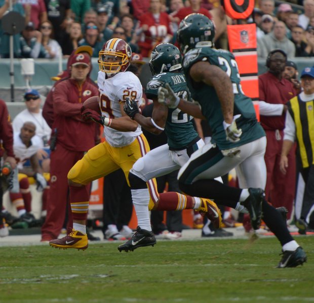 Washington Redskins running back Roy Helu, Jr. runs by Eagles defenders for a gain of 24 yards in the 2nd quarter. Redskins lose to the Eagles 16-24 on Sunday, November 17 at Lincoln Financial Field in Philadelphia.