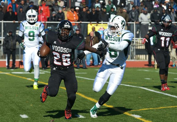 H.D. Woodson defeated Wilson, 25-13, in the 44th Annual Turkey Bowl, a Thanksgiving tradition, in Southeast on Thursday, Nov. 28. H.D. Woodson defeated Wilson, 25-13, in the 44th Annual Turkey Bowl, a Thanksgiving tradition, in Southeast on Thursday, Nov. 28.