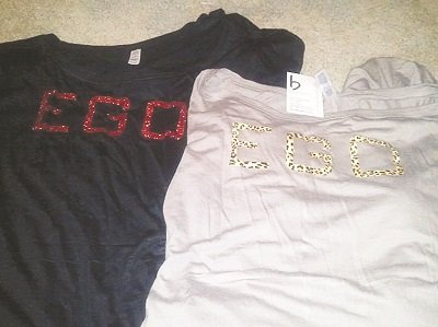 BENNI BLACK — Educated Gorgeous Opinionated: I have enough of these for people to believe they are my initials. When it's time to switch from the professional to the casual, Benni Black’s EGO line of T-shirts and logo tops is essential. Educated, Gorgeous, Opinionated — what an affirmation! Designed to travel well and flatter wearers, EGO is the new white cotton business shirt. (www.benniblack.com)