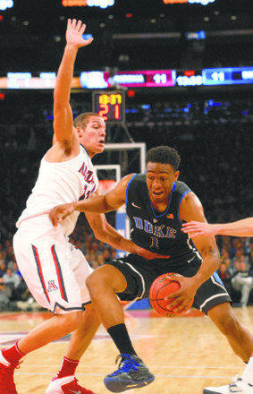Arizona’s Aaron Gordon in a personal one-on-one battle with Duke’s Jabari Parker
