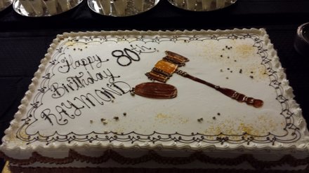 The judge’s birthday cake fittingly featured a gavel.